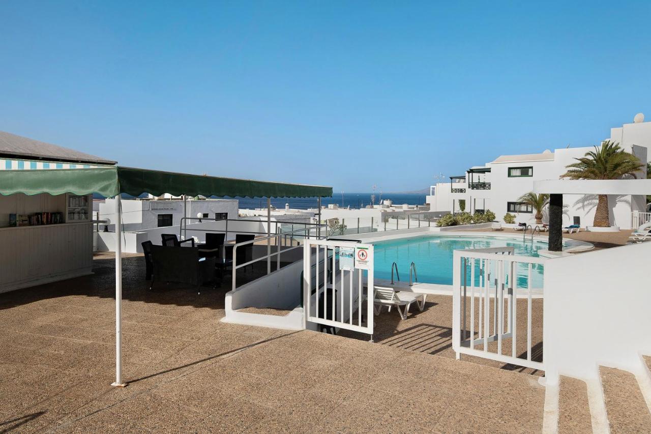 Апартаменты Portonovo Relax - Puerto Del Carmen Пуэрто дель Кармен Экстерьер фото