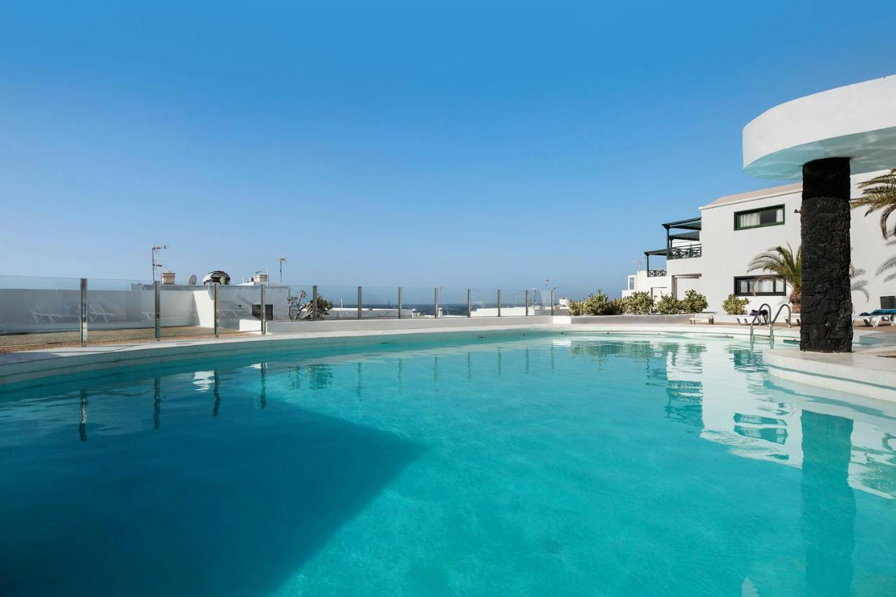 Апартаменты Portonovo Relax - Puerto Del Carmen Пуэрто дель Кармен Экстерьер фото